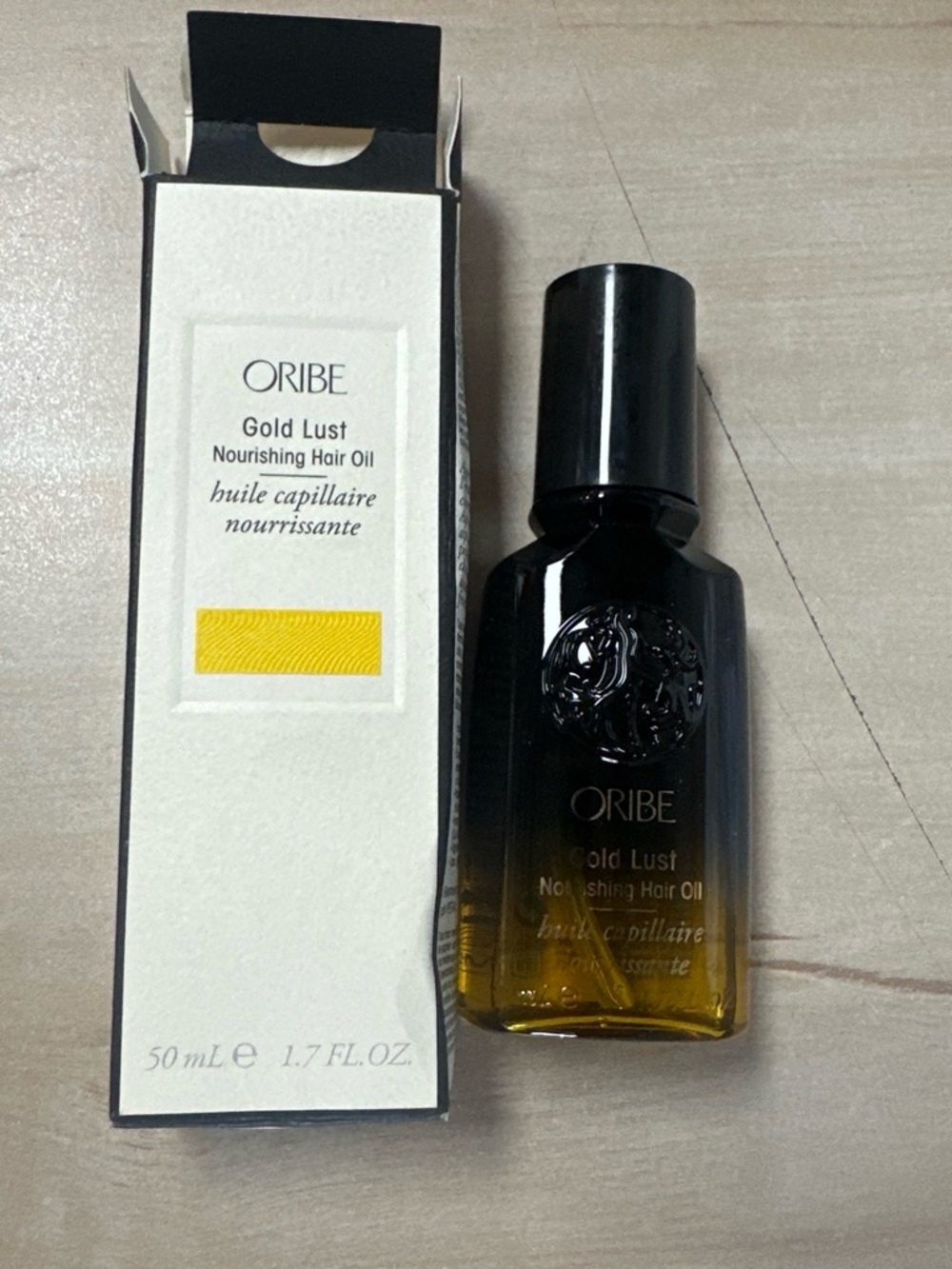 Oribe Gold Lust Nourishing Hair Oil — Black & Amber Gradient